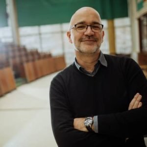 Portrait of smiling professor in the amphitheater